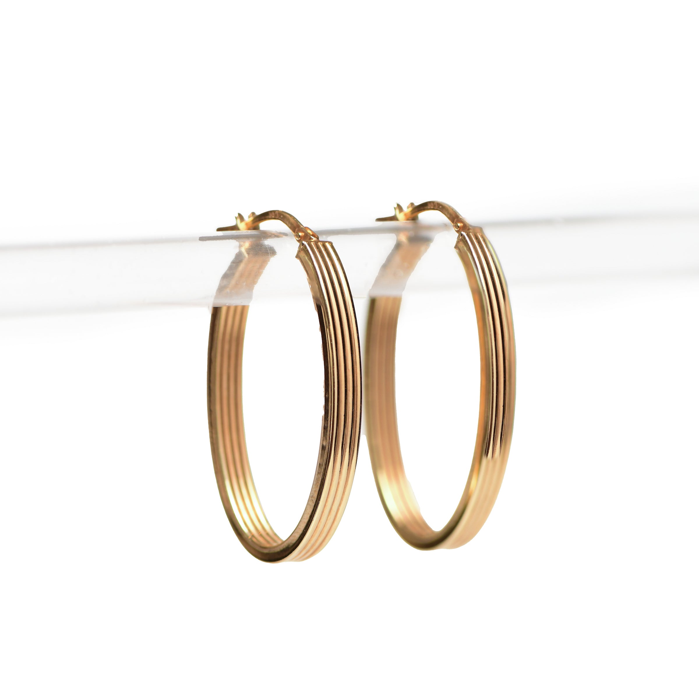 Nalin & Co's 14K Gold Oval Textured Earrings
