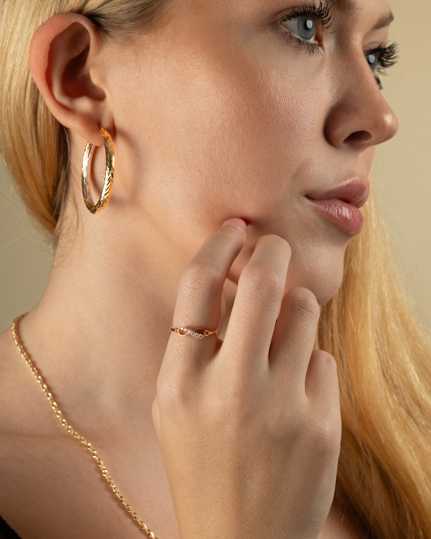 Eternal Glow 14K Gold Infinity CZ Ring – Endless Elegance for $150
