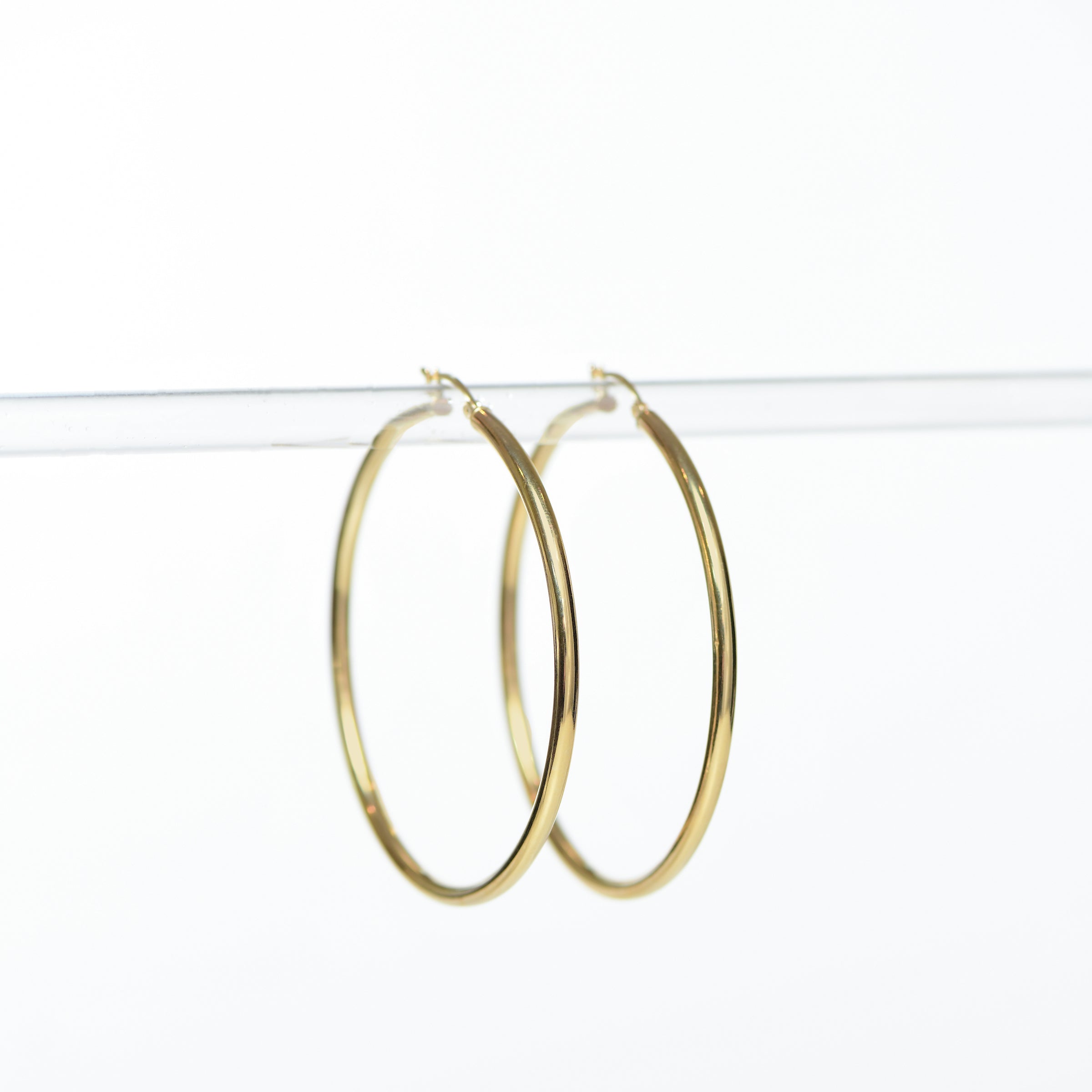 Slim Beautiful Radiant 14K Gold Hoop Earrings
